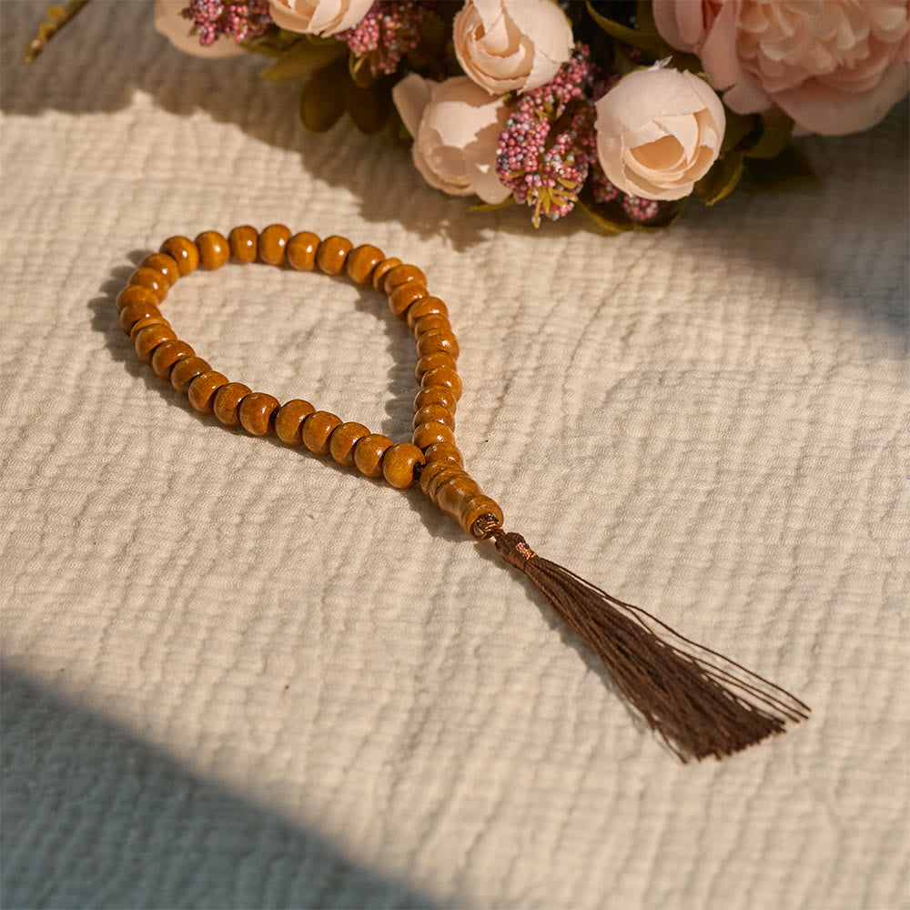 HilalHaven 8mm Round Natural Wood 33 Beads Tasbih — Handcrafted Cultural Prayer Beads with Tassel - 33-Bead Light Brown - image 0