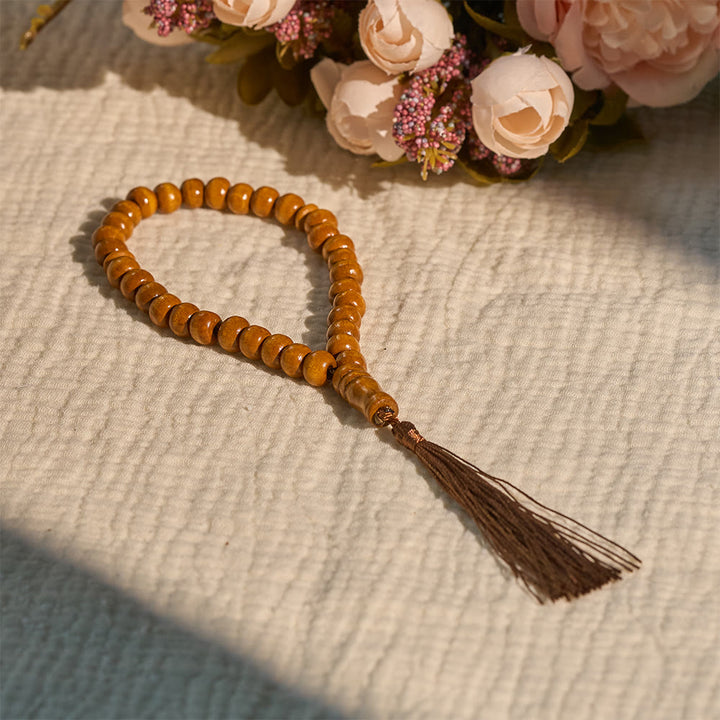 HilalHaven 8mm Round Natural Wood 33 Beads Tasbih — Handcrafted Cultural Prayer Beads with Tassel - 33-Bead Light Brown - image 0