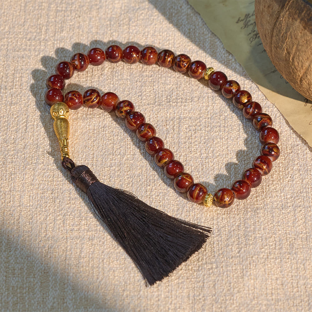 HilalHaven 10mm Explosion-Flower Glass 33 Beads Tasbih - Handcrafted Islamic Prayer Beads with Tassel - Brown - image 0