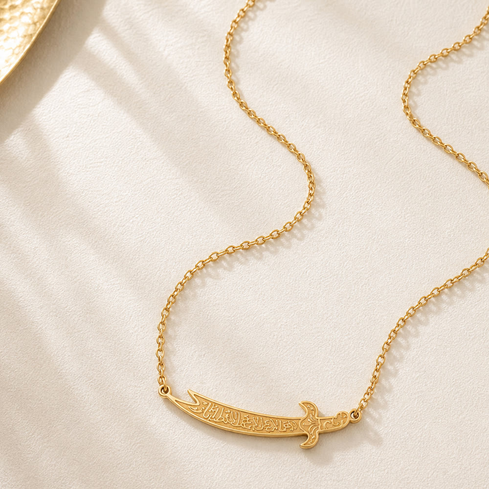 HilalHaven "Graceful Blade" Zulfiqar Pendant Necklace — Polished Titanium Steel - Golden  Zulfiqar - image 0