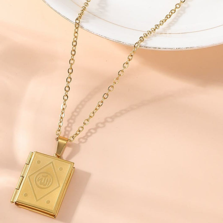 HilalHaven Pages of Remembrance Allah Engraved Locket Pendant Necklace — Polished Titanium Steel - Golden Book - image 1