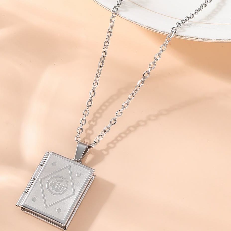 HilalHaven Pages of Remembrance Allah Engraved Locket Pendant Necklace — Polished Titanium Steel - Silver Book - image 0