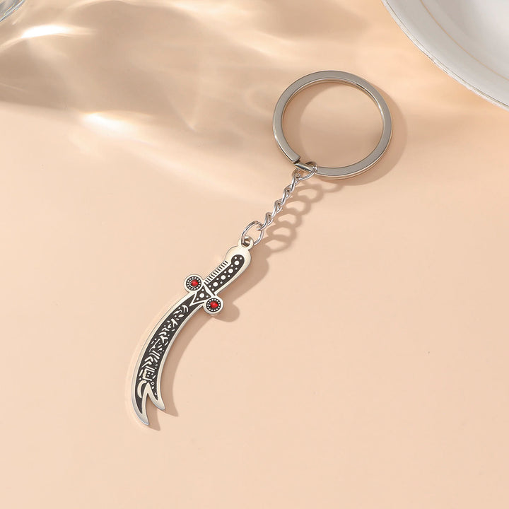 HilalHaven Warrior’s Verse Engraved Zulfiqar Keychain  - Zulfiqar Sword - Silver - image 1