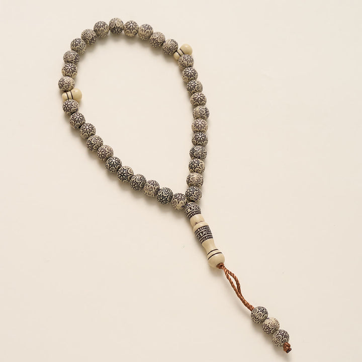 HilalHaven Timber Serenade Textured Carved 33 Beads Tasbih — Artisan-Crafted Natural Wood Pocket Prayer Strand - image 9