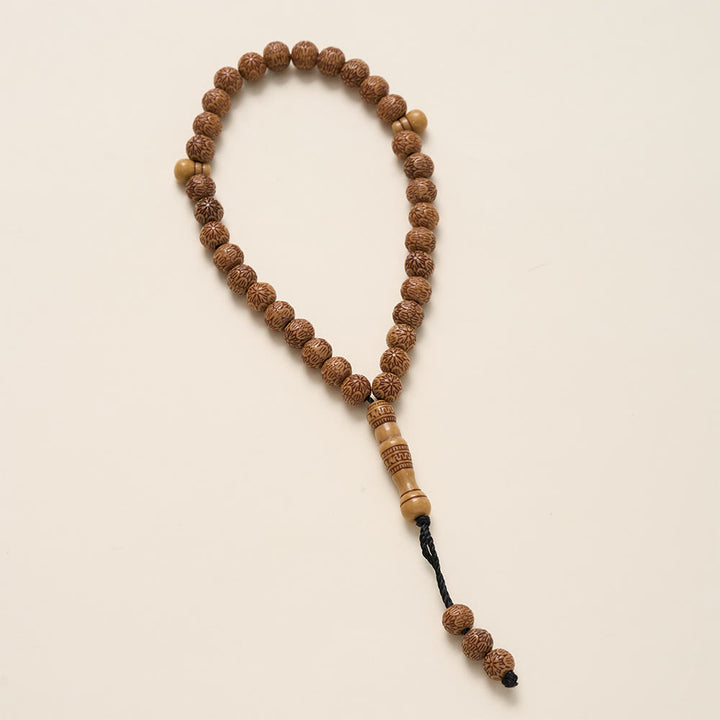 HilalHaven Timber Serenade Textured Carved 33 Beads Tasbih — Artisan-Crafted Natural Wood Pocket Prayer Strand - image 3