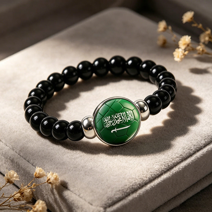 HilalHaven Desert Kick Heritage Crest Beaded Bracelet — Hand-strung Black Glass Bead Unisex Fan Wristband - image 1