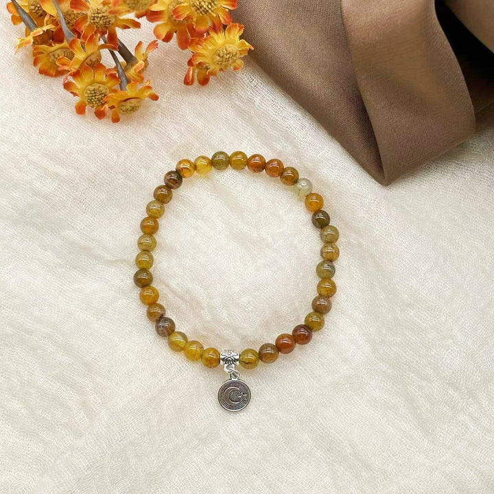 HilalHaven Prismatic Circular Cadence Agate Meditation Bracelet— Handcrafted Symmetrical Ornamental 33-Bead Bracelet - Yellow - image 4