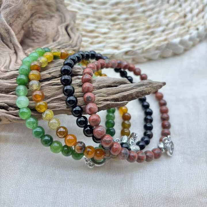 HilalHaven Prismatic Circular Cadence Agate Meditation Bracelet— Handcrafted Symmetrical Ornamental 33-Bead Bracelet - image 0