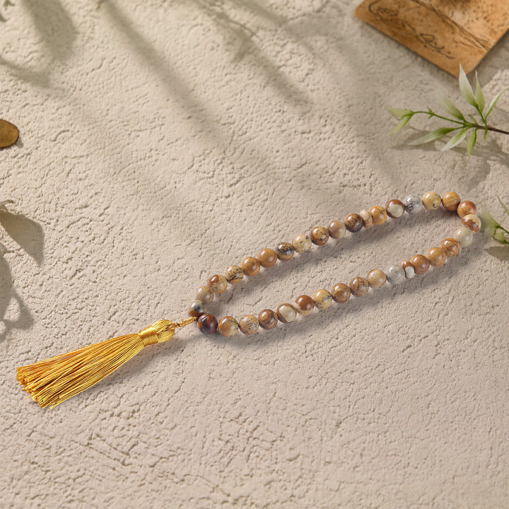HilalHaven Polished Orbital Serenity Natural Stone Tassel 33 Beads Tasbih - Amber Tione - image 1
