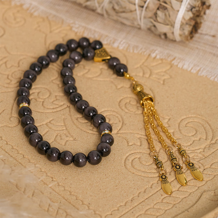 HilalHaven Polished Round Stone Multi-Tone Tassel Meditation Strand Golden Detail Glass 33 Beads Tasbih - Matte Dark Stone Tone - image 0