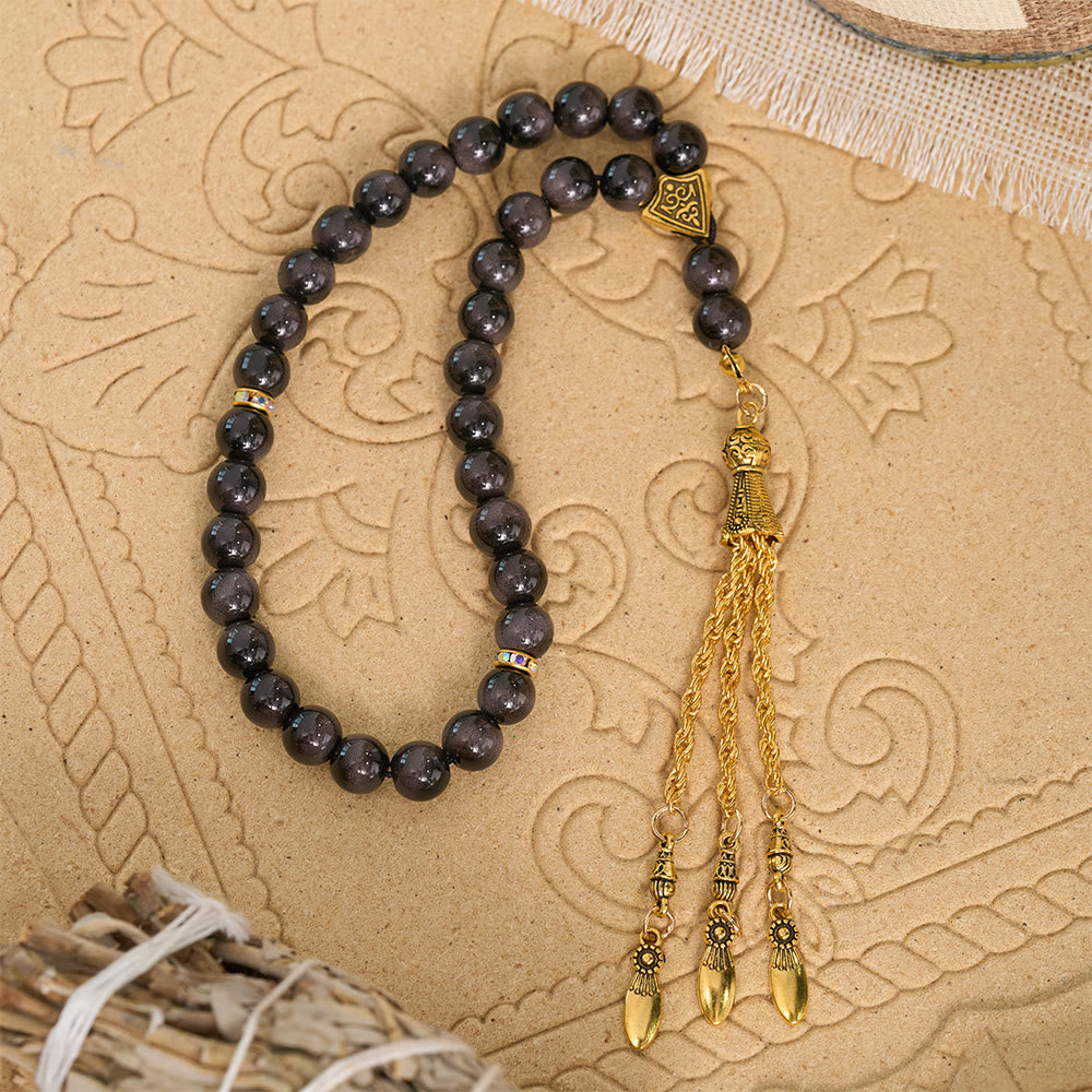 HilalHaven Polished Round Stone Multi-Tone Tassel Meditation Strand Golden Detail Glass 33 Beads Tasbih - image 1