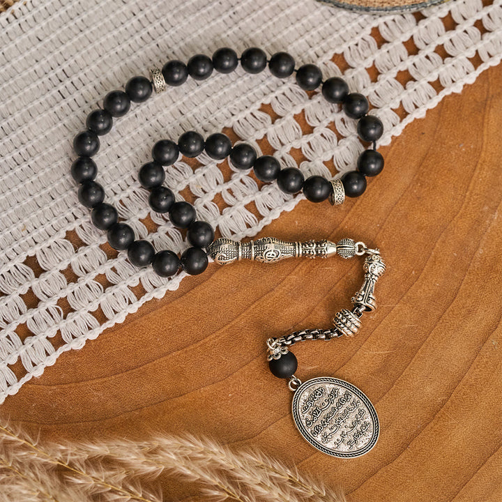 HilalHaven Matte‑Stone Bead‑Strand with Calligraphic Oval‑Pendant 33 Beads Tasbih - Black - image 0