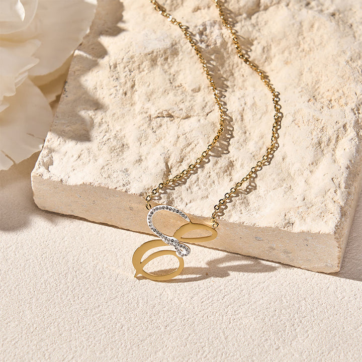 HilalHaven Dual Script Intertwined Initial Arabic&amp;English Letter Two-Tone Inlaid Crystal Titanium Steel Women’s Letter Necklace  - image 7