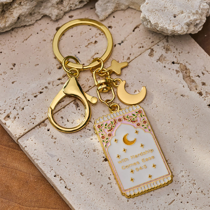 HilalHaven "With Hardship Comes Ease" Gentle Assurance  Floral‑Bordered Charm with Moon‑Star Accent Enamel Keychain - White - image 3