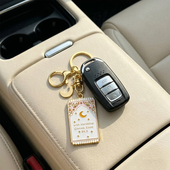HilalHaven "With Hardship Comes Ease" Gentle Assurance  Floral‑Bordered Charm with Moon‑Star Accent Enamel Keychain - image 5