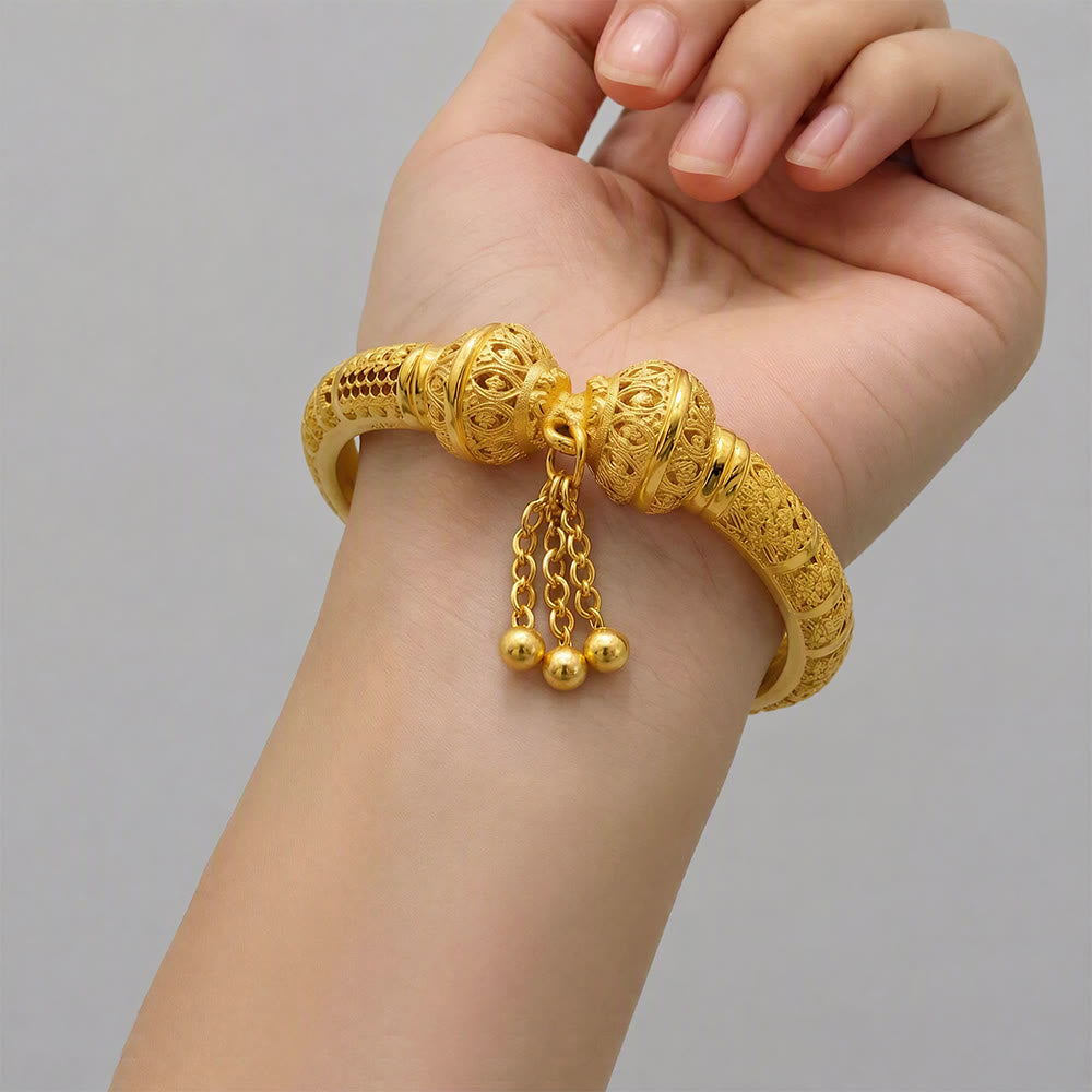 HilalHaven Filigree Sphere Tassel Bangle‑Gold‑Plated Copper Hollow‑Bead Cuff Bracelet - image 0