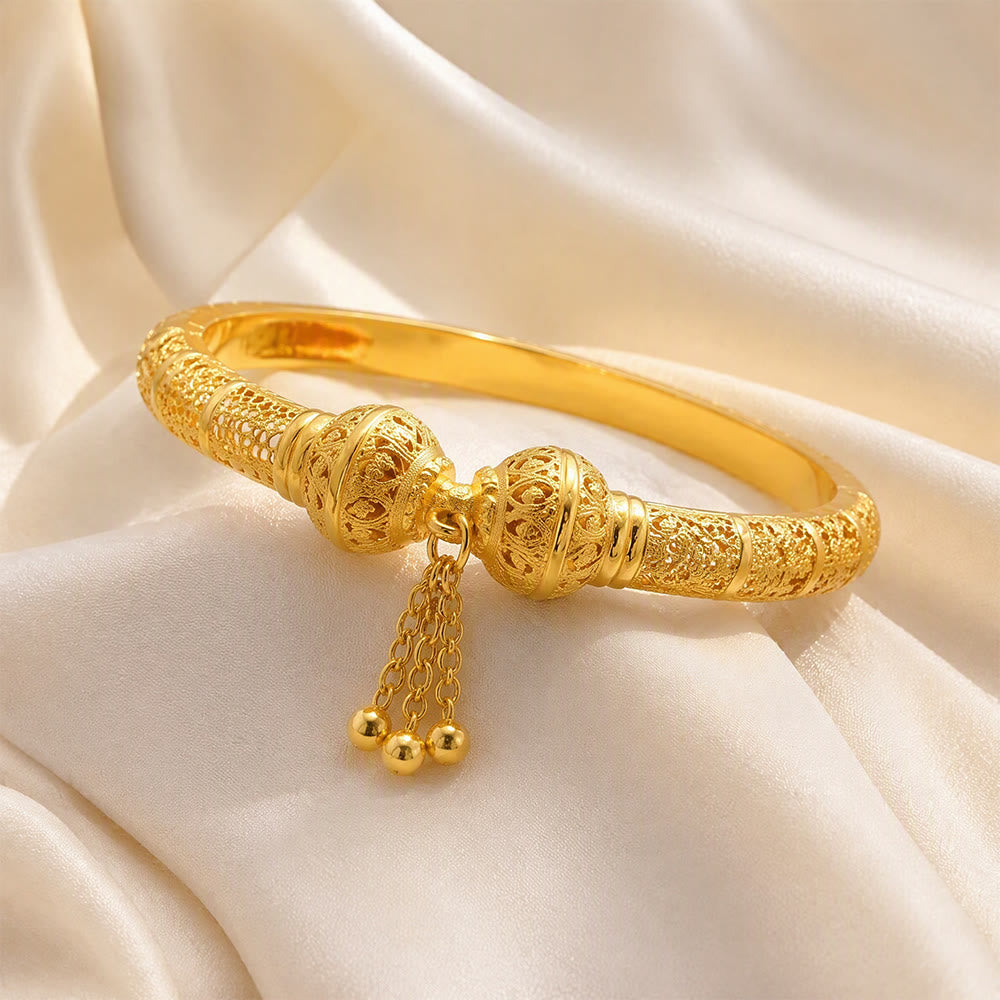 HilalHaven Filigree Sphere Tassel Bangle‑Gold‑Plated Copper Hollow‑Bead Cuff Bracelet - image 1