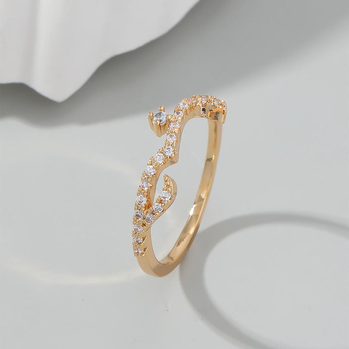 HilalHaven Luminous Cursive Twisted Letter Ring - image 1
