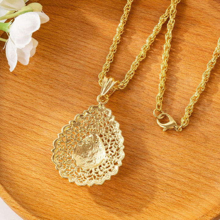 HilalHaven Palace Filigree Gem Zinc Alloy Necklace — Vintage Hollow‑Mesh Teardrop Pendant with Twisted Rope Chain - image 4
