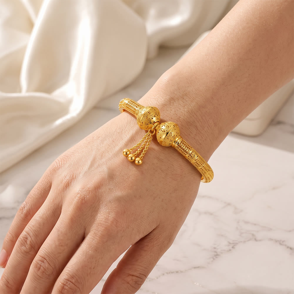 HilalHaven Filigree Sphere Tassel Bangle‑Gold‑Plated Copper Hollow‑Bead Cuff Bracelet - image 1