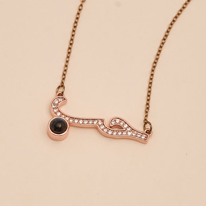 FREE Today: Inlaid Zircon "Hubb - Love" Arabic Calligraphy Projection Pendant - image 9