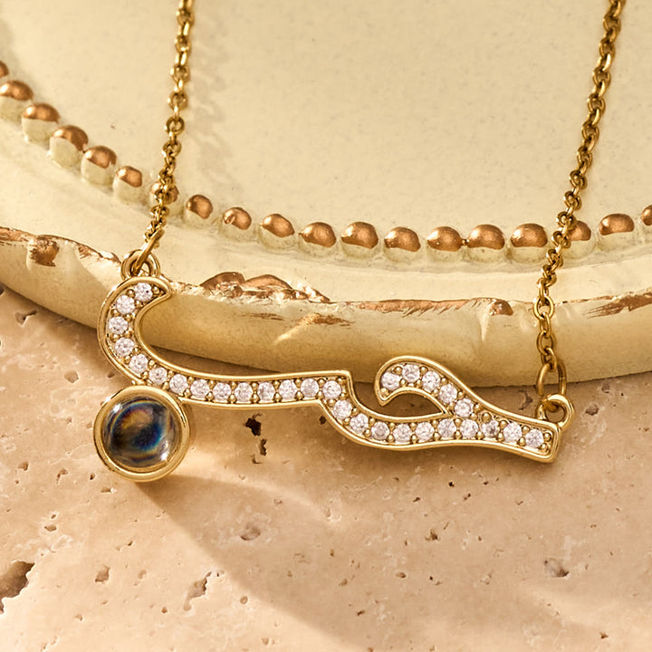 FREE Today: Inlaid Zircon "Hubb - Love" Arabic Calligraphy Projection Pendant - image 0