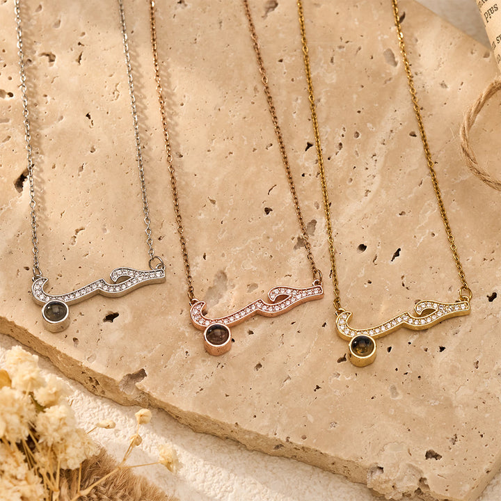 FREE Today: Inlaid Zircon "Hubb - Love" Arabic Calligraphy Projection Pendant - image 1