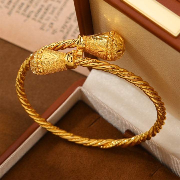 HilalHaven Twist Tassel Golden Plated Copper Open Bangle - image 0