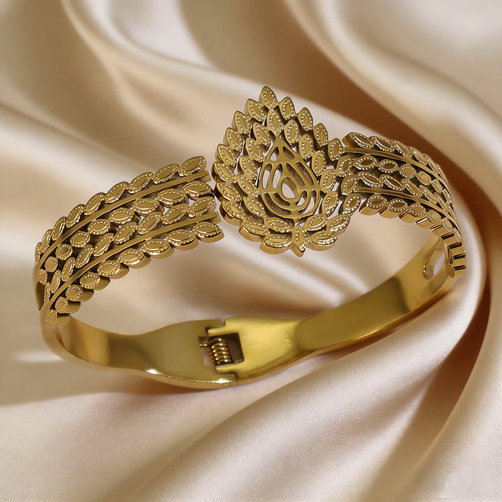 HilalHaven Vintage Foliage Stainless Steel Hollow Leaf Rhinestone Spring Bangle - Golden - image 0